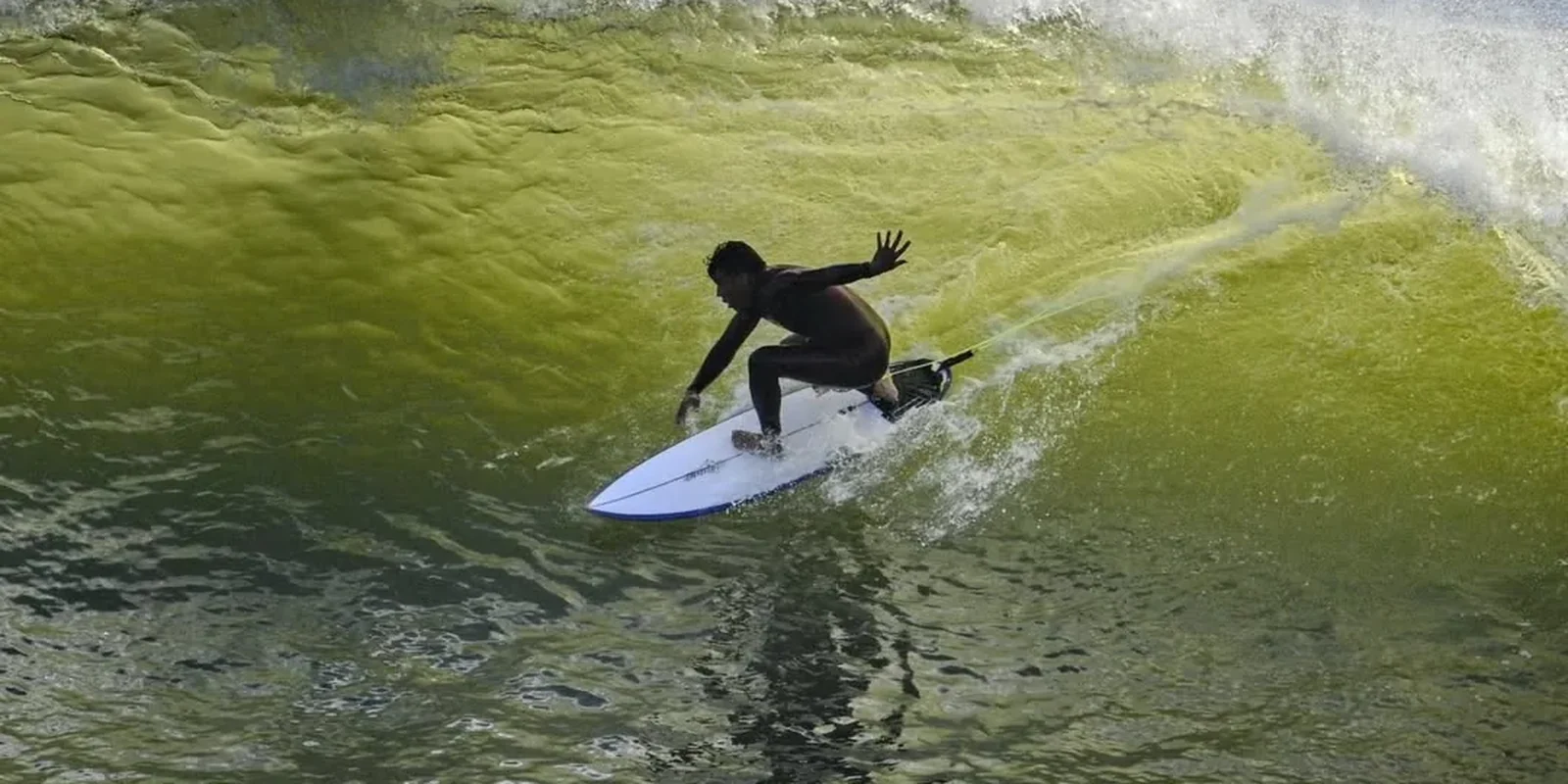 Surfer drawing a turn on an Atlantic wave in Portugal